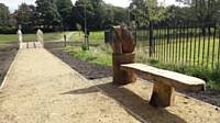 The Hedgehog wood carved bench and news path and bridge August 2017